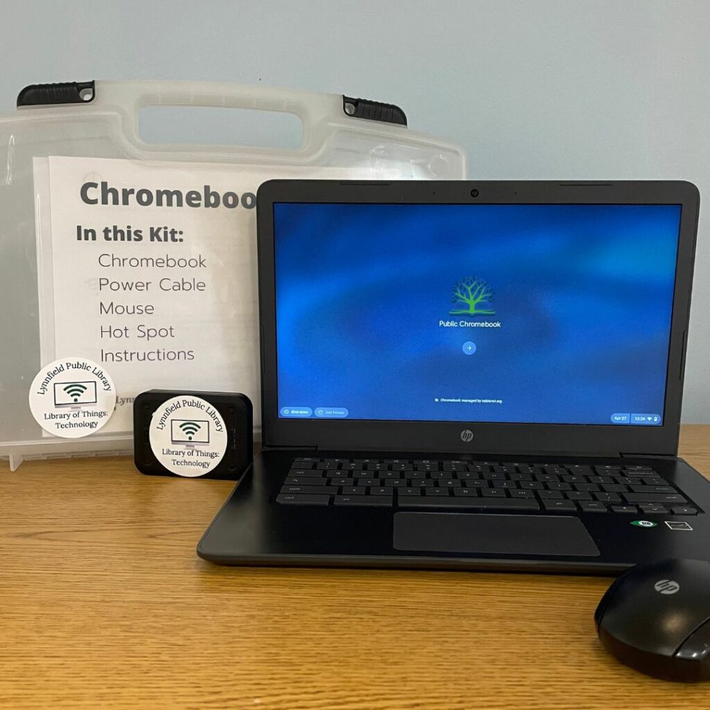 A kit containing a chromebook, a hot spot, a mouse, and instructions for using all three.