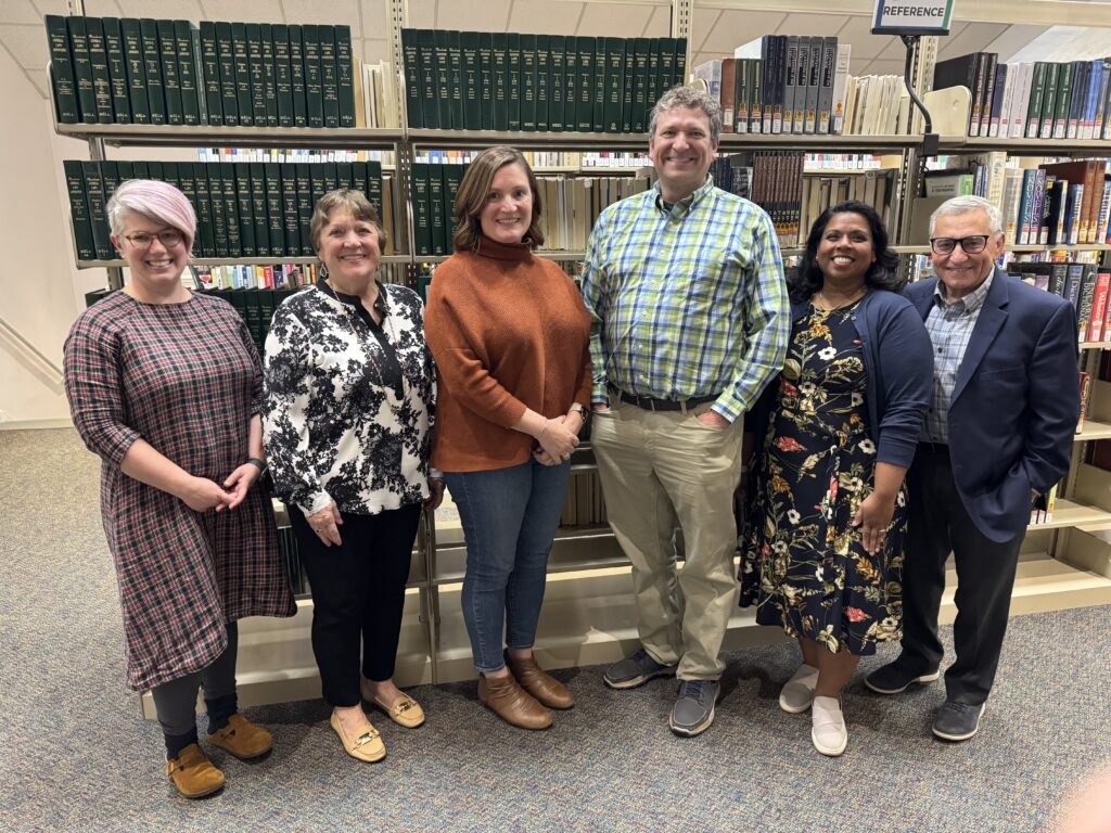 An image of the Library Director and Board of Trustees.